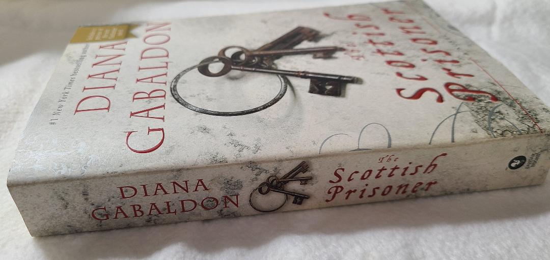 Used The Scottish Prisoner By: Diana Gabaldon