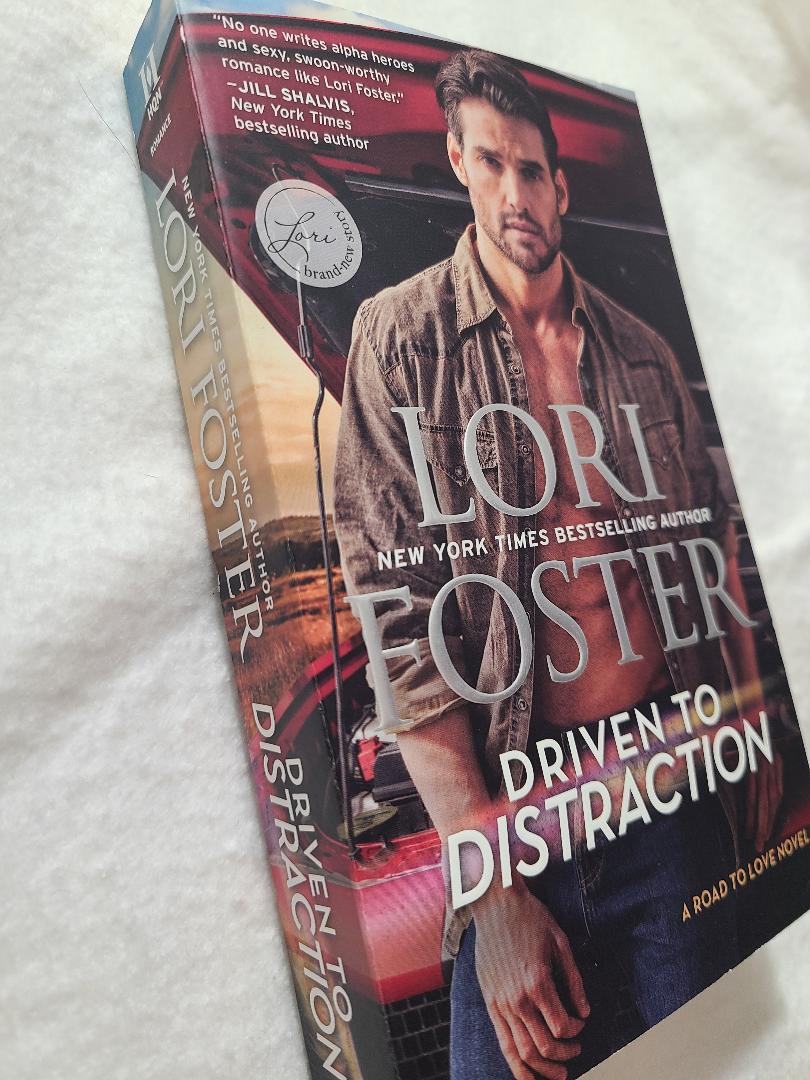 Used Driven To Distraction By: Lori Foster